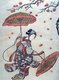 Japan: A bijin or beautiful woman with two parasols on an autumn day. Suzuki Harunobu (1724-1770)